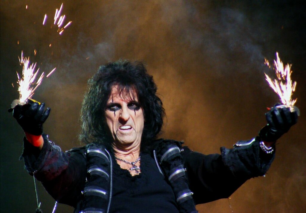 Rocker Alice Cooper Sounds Off On Trans Kids ‘Fad’ And The ‘Whole Woke Thing’ Alice Cooper on stage