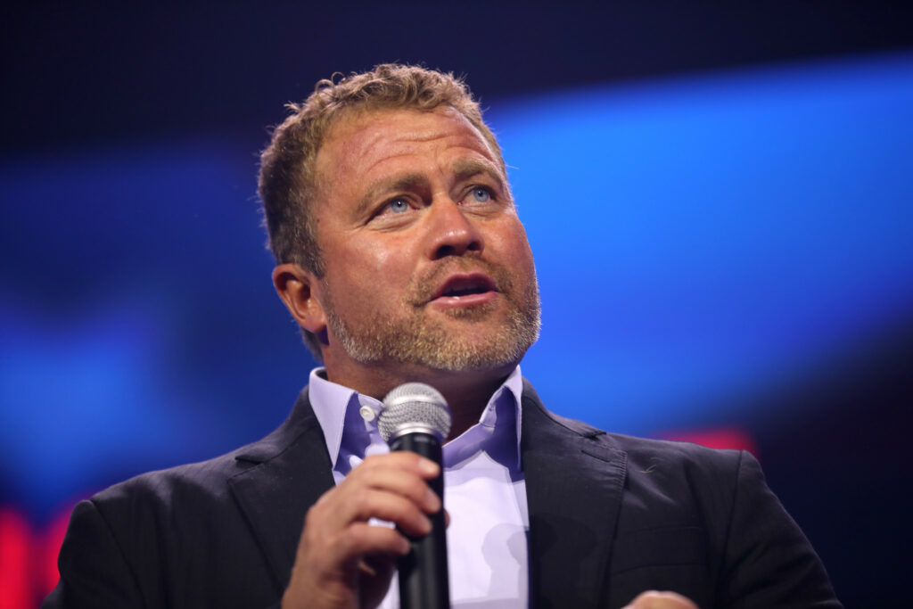 Sound Of Freedom Boss Accused Of Groping Underage Sex Trafficking Victim After Film’s Inspiration Accused Of Sexual Misconduct Tim Ballard on stage